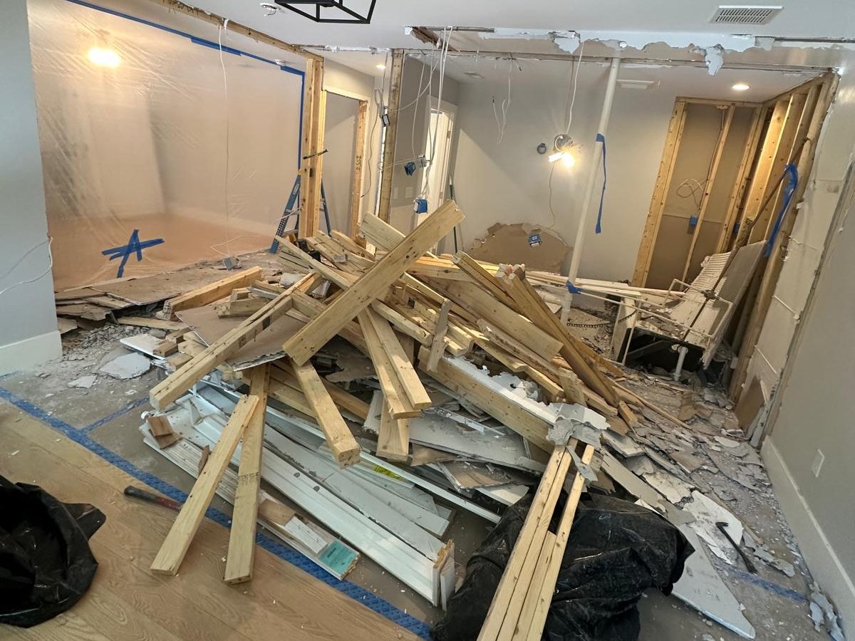 Old partition walls demolished and stacked for removal