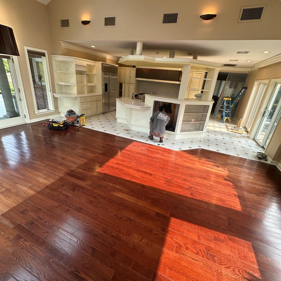 The original kitchen as the crew begins removing cabinets