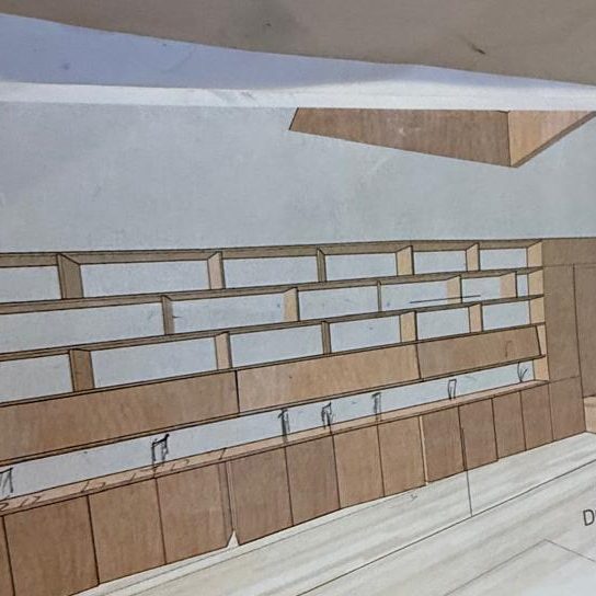 Printed design for the library wall used on site during the build