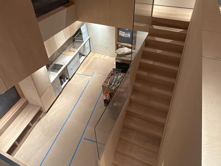 View down the oak stair toward the kitchen below