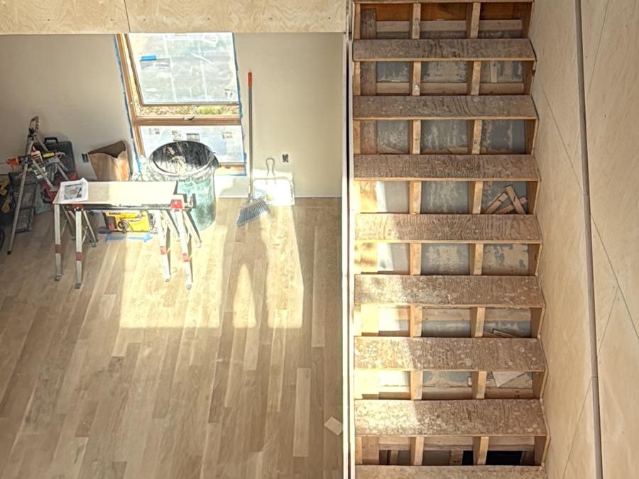 Top-down view of the framed stair before treads and risers